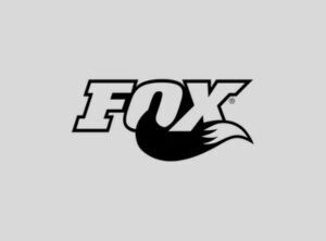 Fox Racing logo featuring the word FOX with a stylized fox tail curling from the letter X for brand contact.